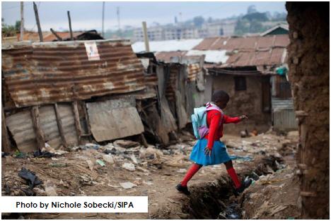 Six-year-old Elizabeth Atenio walks two hours every day to attend classes at the Kibera School for Girls in Nairobi.