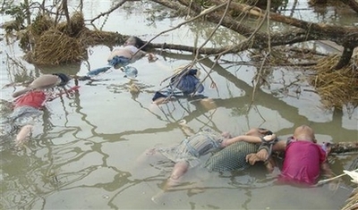 In this photograph released by Democratic Voice of Burma on Friday, May 9, 2008, bodies of children killed during Cyclone Nargis lay in water in an unknown location in Myanmar.(AP Photo/str)